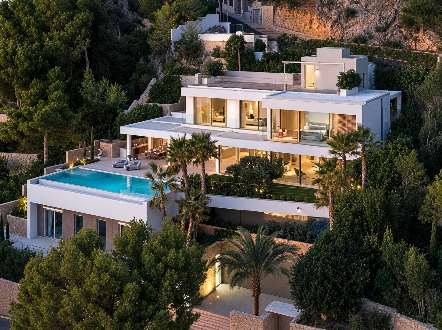 Aerial view of a luxury villa with garden and pool in Mallorca