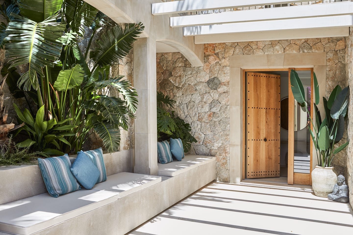 Villa entrance with tropical garden plants in Mallorca